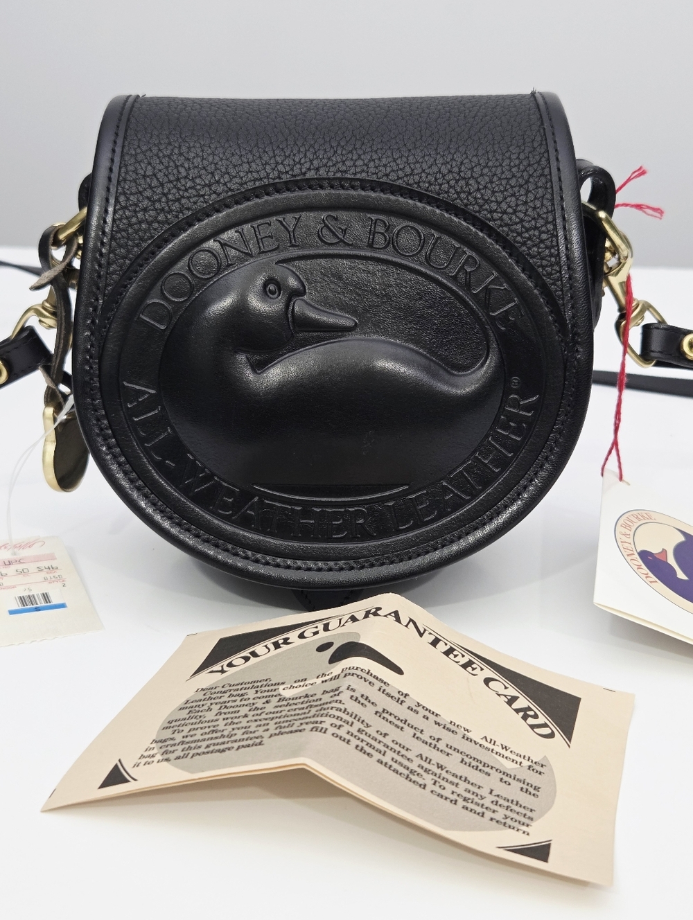 NWT RARE VINTAGE DOONEY & BOURKE AWL ALL WEATHER LEATHER BIG DUCK CROSSBODY BAG